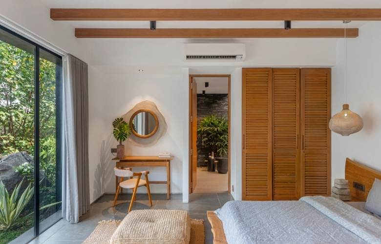 DIY bedroom design for 2022 with wooden interiors & cane décor - Beautiful Homes