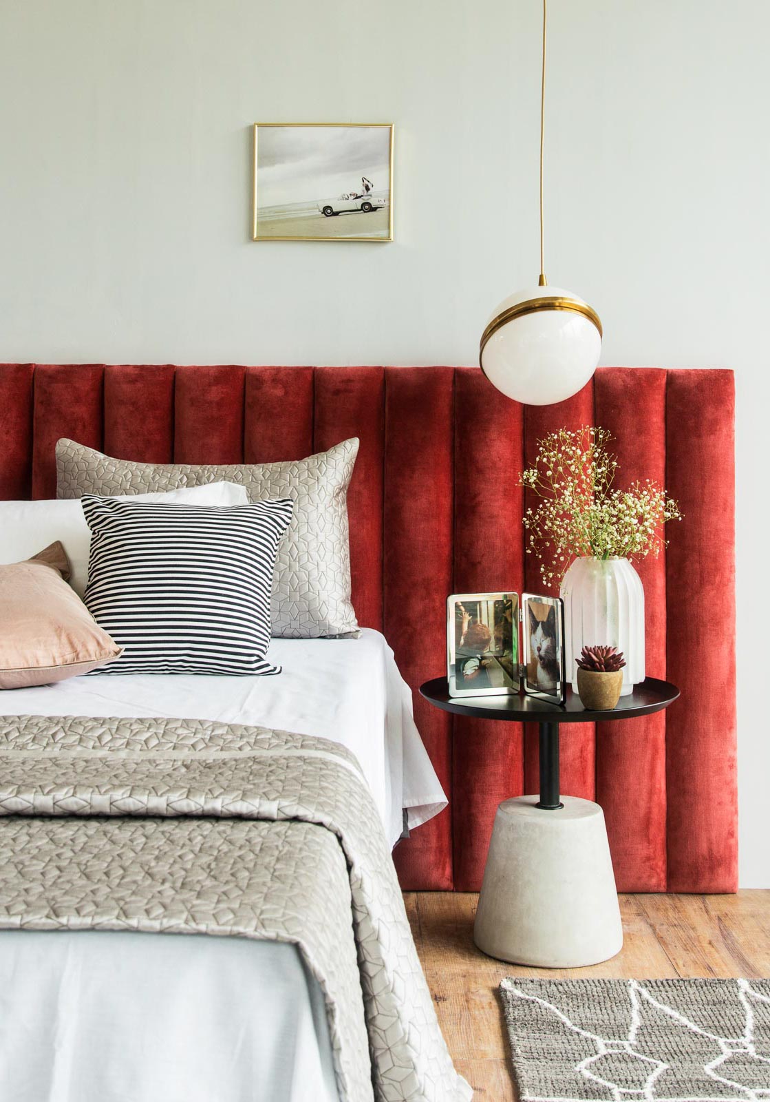 Bed Corner Design With Red Tufted Headboard, Hanging Lamp - Beautiful Homes