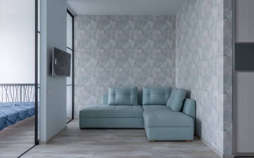Geometrical wallpaper design pattern in the living room - Beautiful Homes