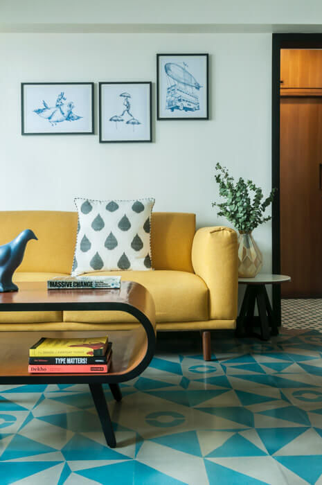 Anchor your living room furniture with a bold geometric rug or flooring for bold patterns - Beautiful Homes