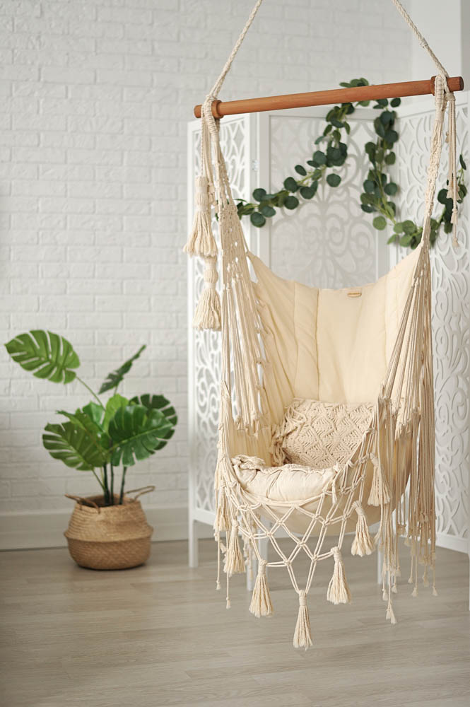 Use a minimal sack swing in your living room interior design for a bohemian living room feel - Beautiful Homes