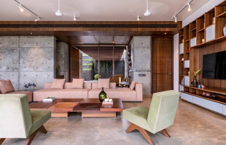Living room with wooden theme & pastel coloured furniture - Beautiful Homes