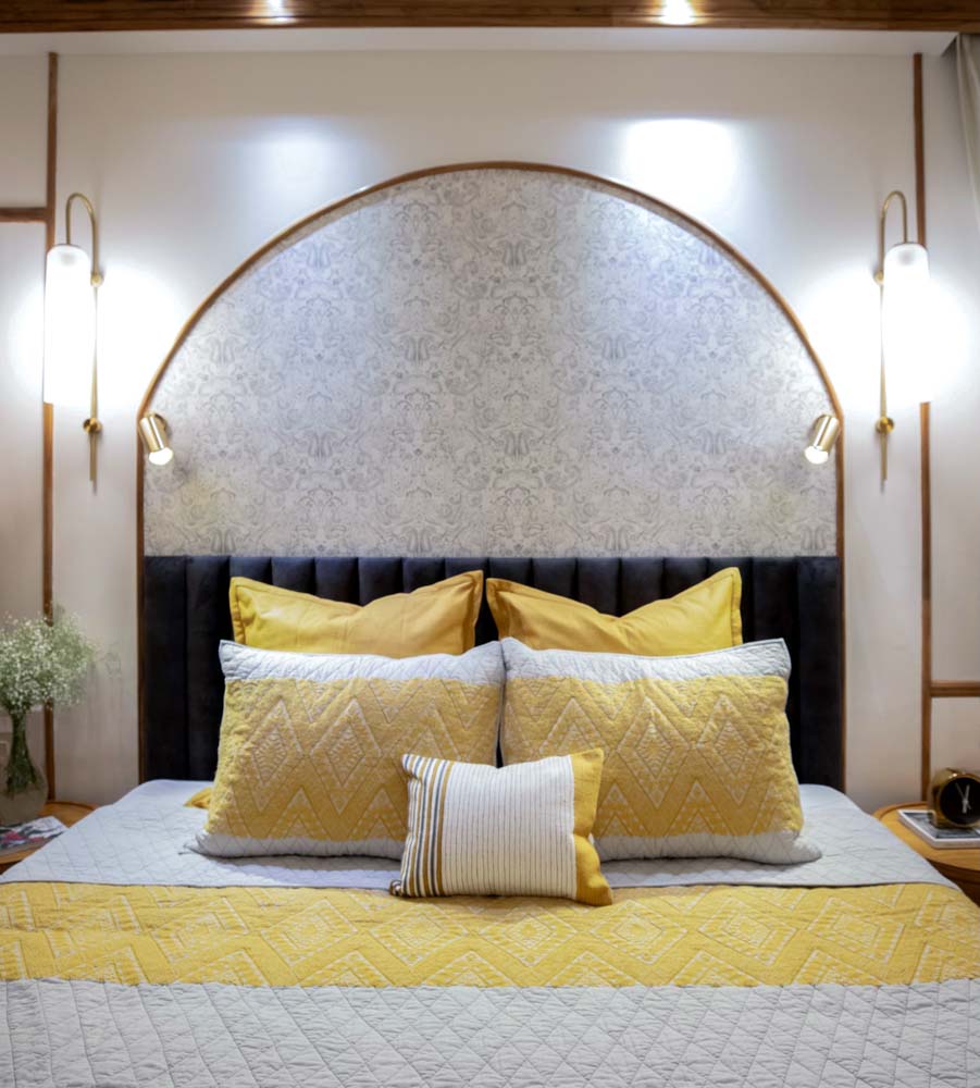 Bedroom with arched alcove on the wall & floral wallpaper in Chennai - Beautiful Homes