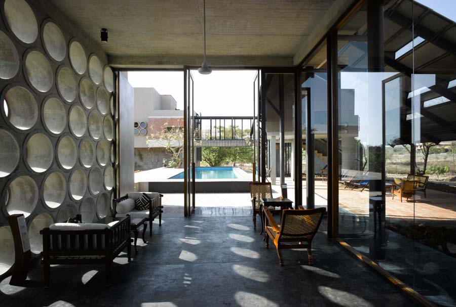 Interiors of Camera house with a view of the pool