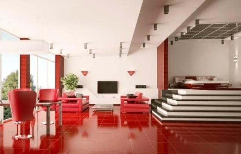 Seating area with red tile flooring - Beautiful Homes