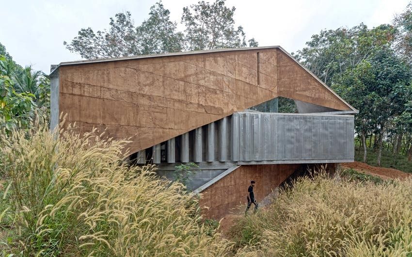 The Shikara house from outside surrounded by greens