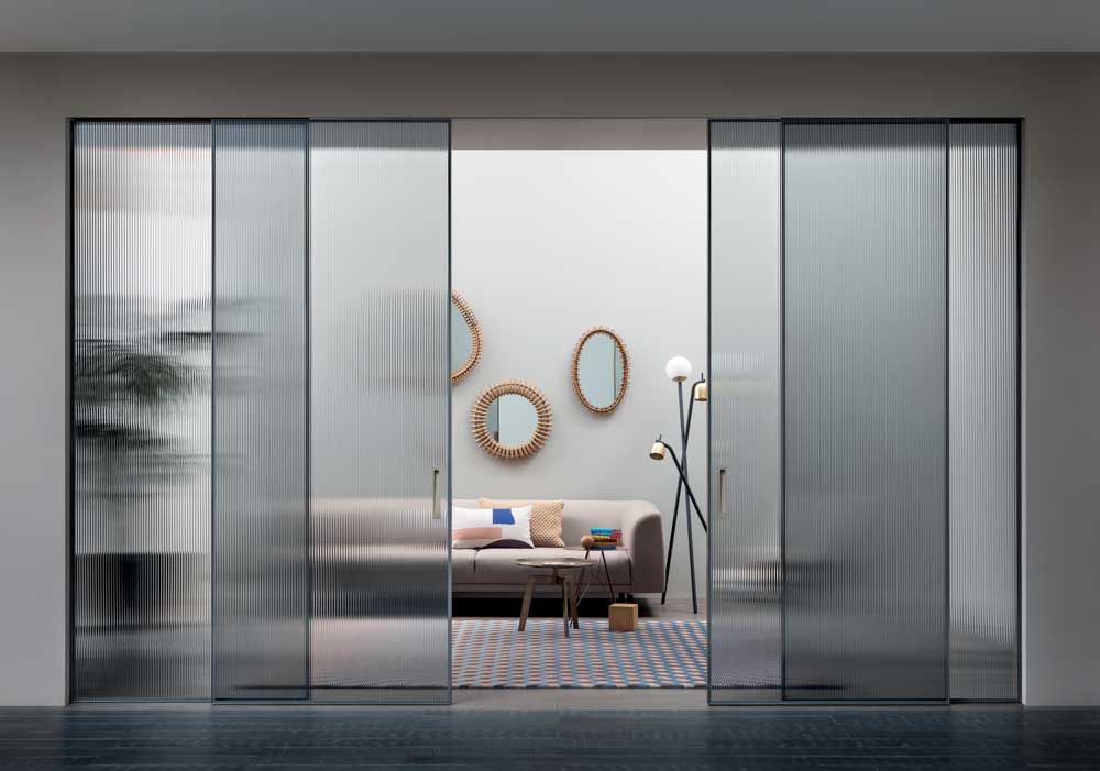 Add a translucent patterned sliding door design in your home interiors - Beautiful Homes