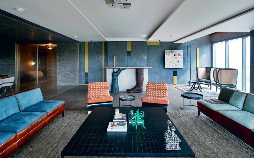 Blue wall paint design for living room - Beautiful Homes