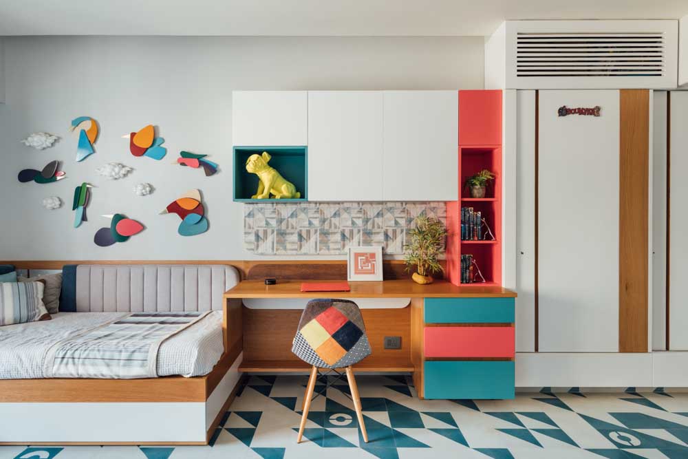 Light grey wall design for kids room with multi colour furniture - Beautiful Homes