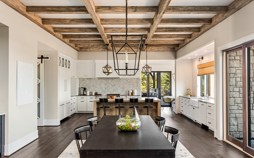 Dining room ceiling design with wood rafters - Beautiful Homes
