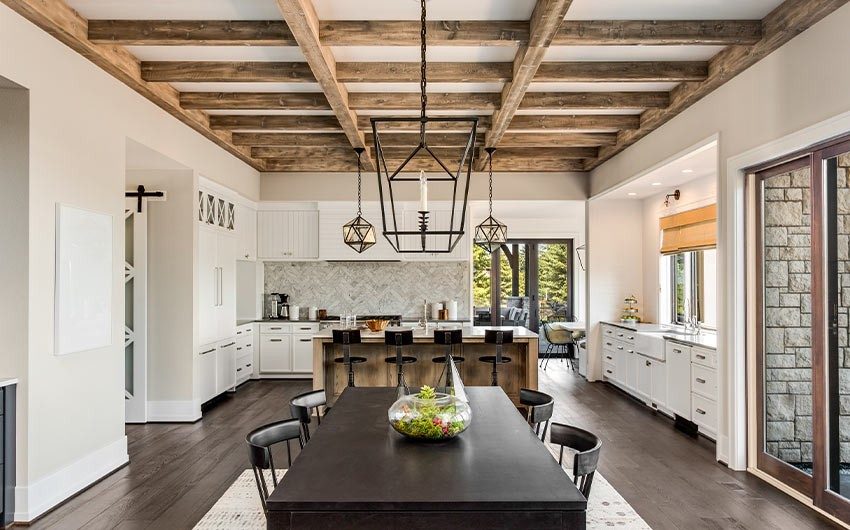 Dining room ceiling design with wood rafters - Beautiful Homes