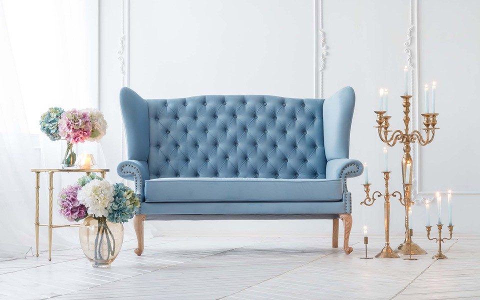 a classic, tufted sofa