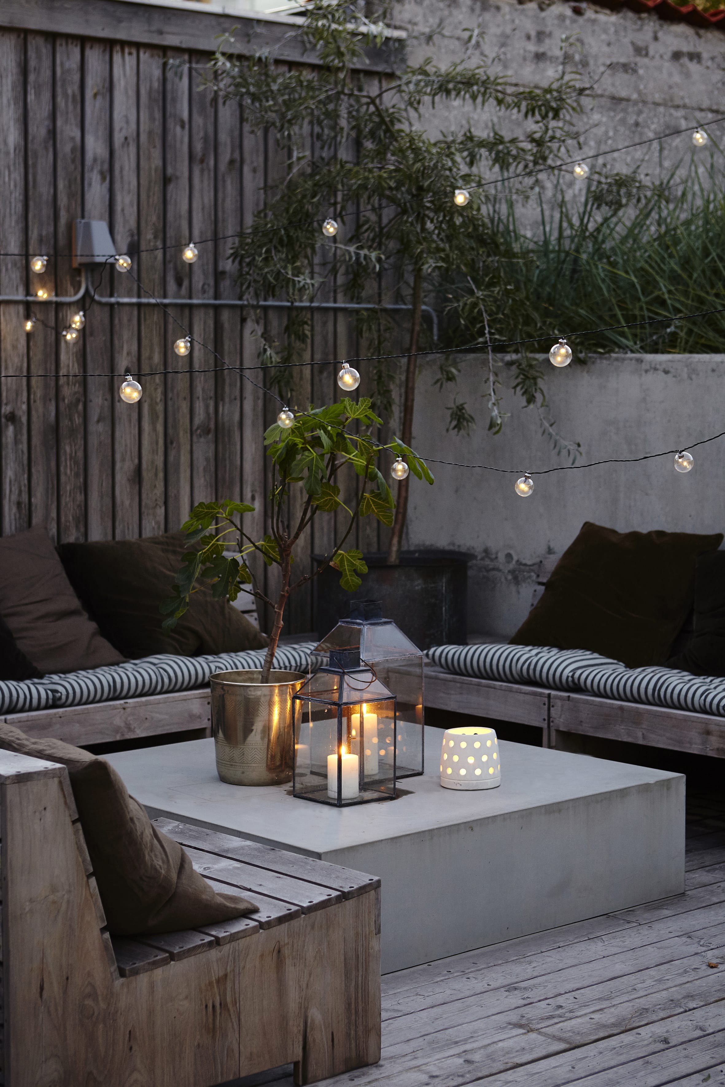 Create a stylish patio with candles, soft furnishings & fairy lights - Beautiful Homes