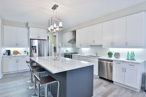 Island modular kitchen with acrylic finish on kitchen cabinets - Beautiful Homes