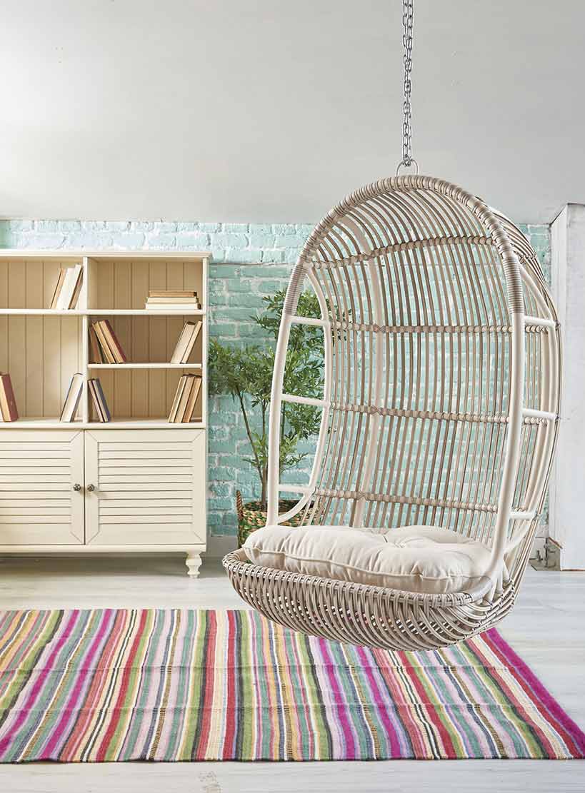 A swing fixed with a sturdy hook in the ceiling slap - Beautiful Homes