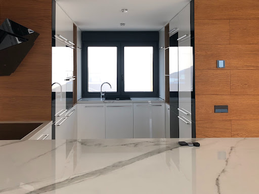 Small modular kitchen with long straight drawer & cabinet handles - Beautiful Homes