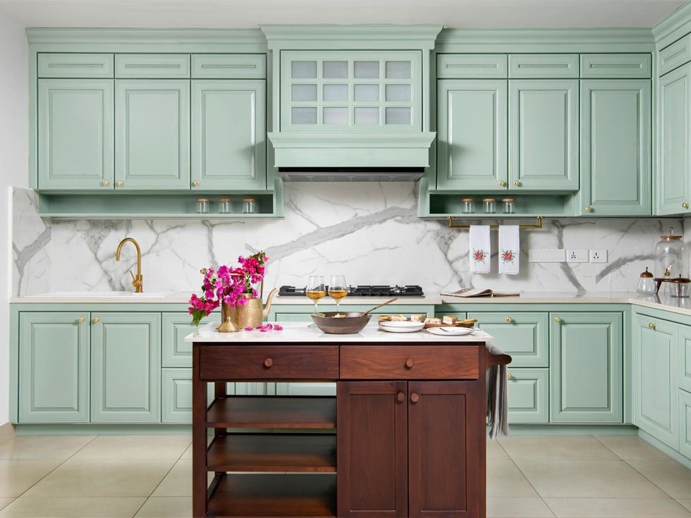 All white modular kitchen design with an island & base cabinets - Beautiful Homes