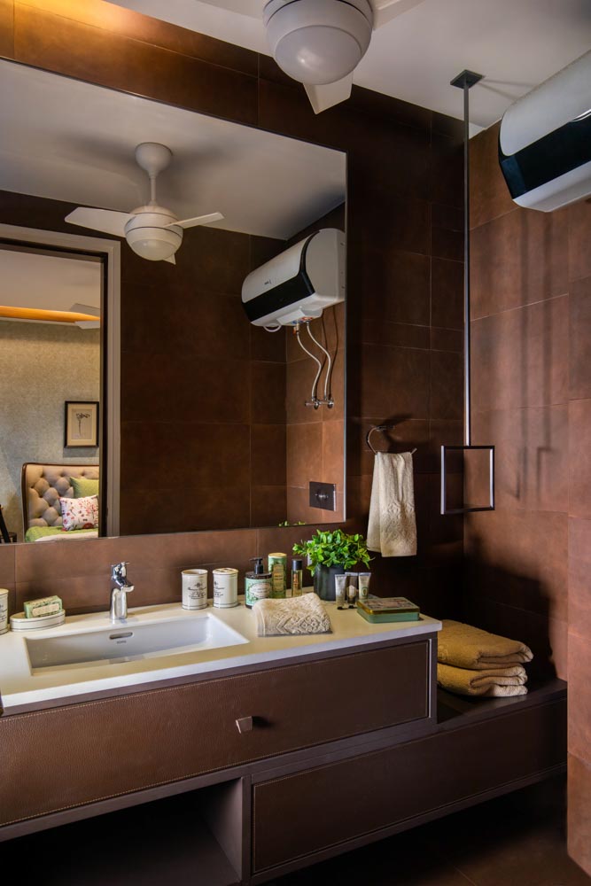 Chocolate brown colour bathroom design with white ceiling  - Beautiful Homes
