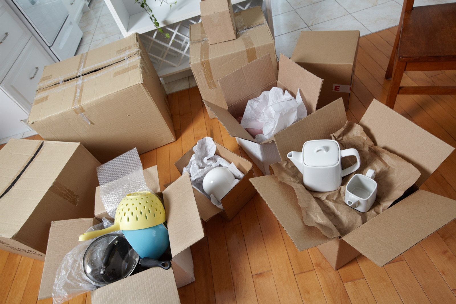 The stuff packed in bubble wrapped or covered in newspaper to minimise damage during transport - Beautiful Homes
