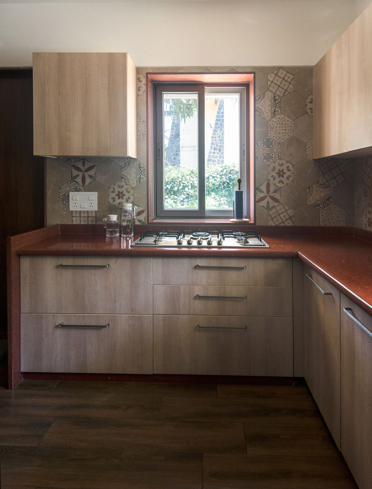 Simple Kitchen Design with Laminate, Glass Shutters and Glossy Kitchen - Beautiful Homes