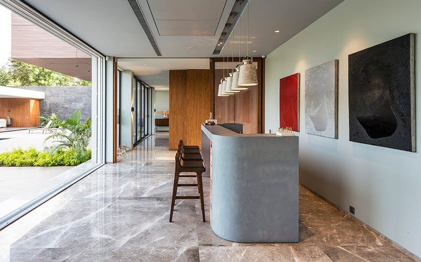 Marble tiles design in a bar opened to the outside - Beautiful Homes