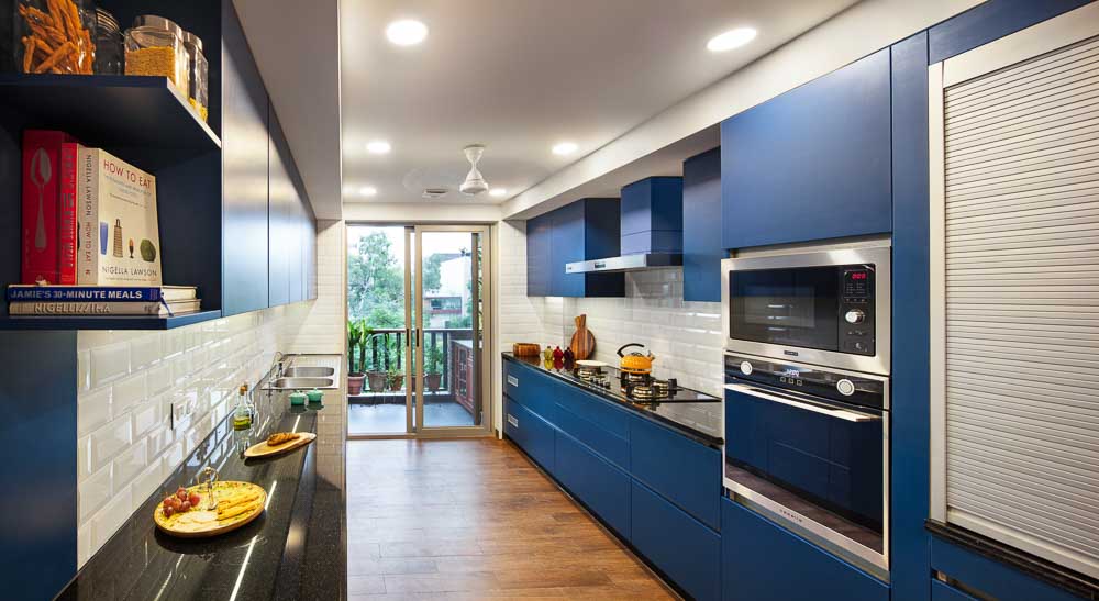 Modular closed space kitchen for privacy attached balcony for some open space kitchen experience making it a hybrid layout - Beautiful Homes