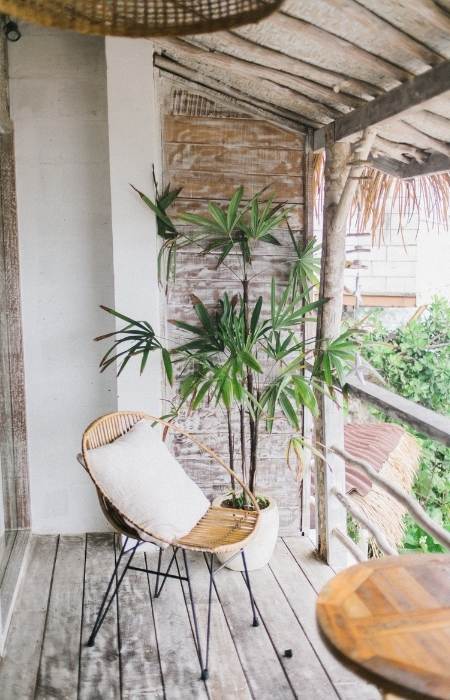 Small balcony layout with cane chairs - Beautiful Homes