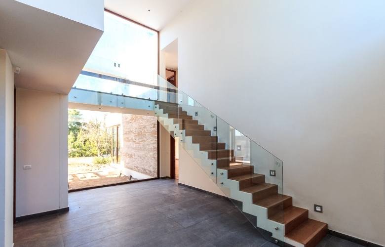 Glass railing design for the indoor of the house - Beautiful Homes