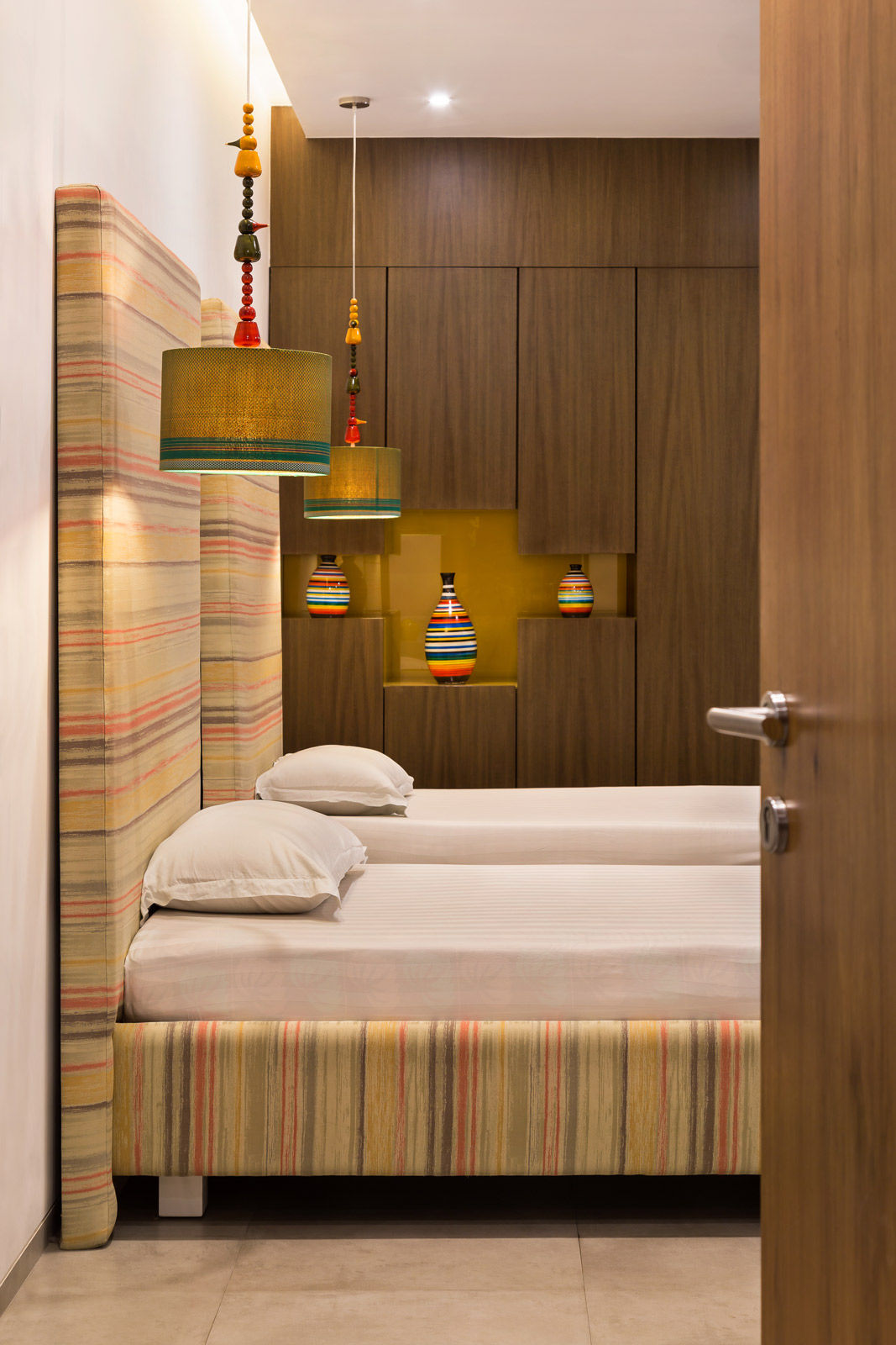 The bedroom in an earthy penthouse duplex - Beautiful Homes