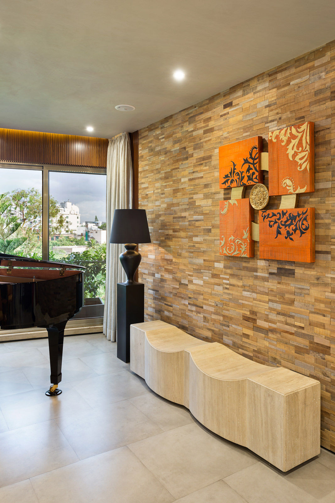 The piano room in an earthy penthouse duplex - Beautiful Homes