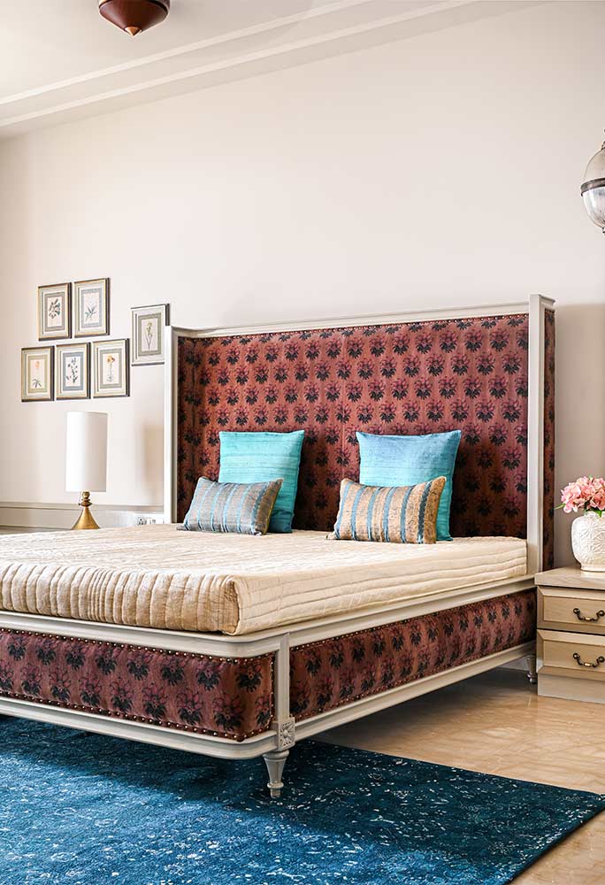 Use double bed crafted in solid wood & stained in a light hue to give unique look to your master bedroom - Beautiful Homes