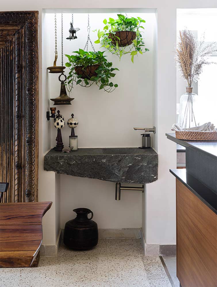 Stone sink design with plant décor - Beautiful Homes