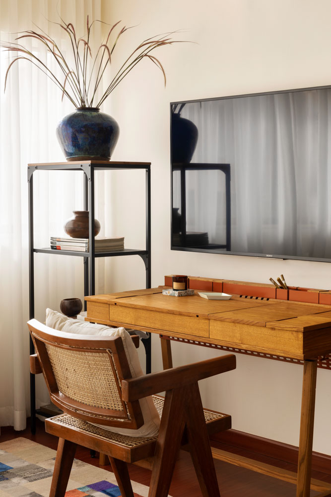 Solid wooden desk in the guest bedroom with small storage - Beautiful Homes
