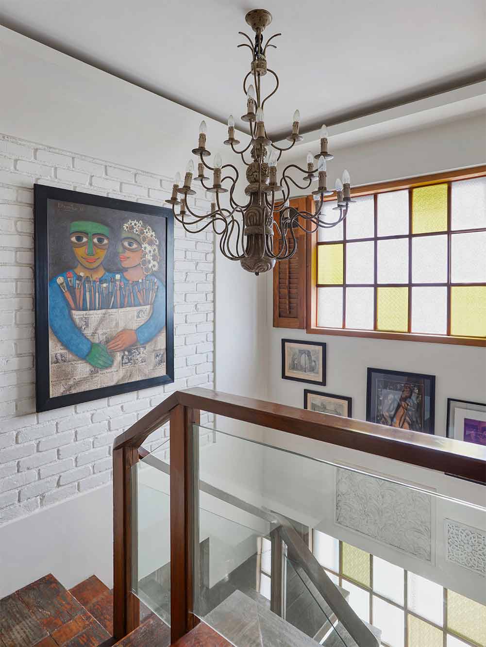 Vintage Stained Glass Windows In A Well-lit Atrium - Beautiful Homes