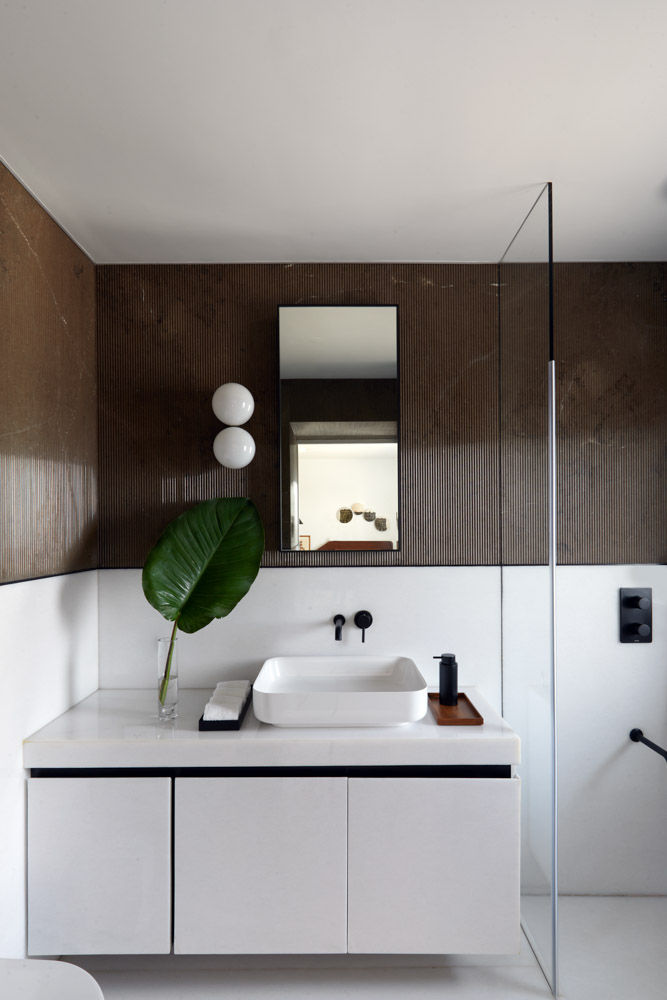 Compact bathroom design with white marble interiors for bathroom decor- Beautiful Homes