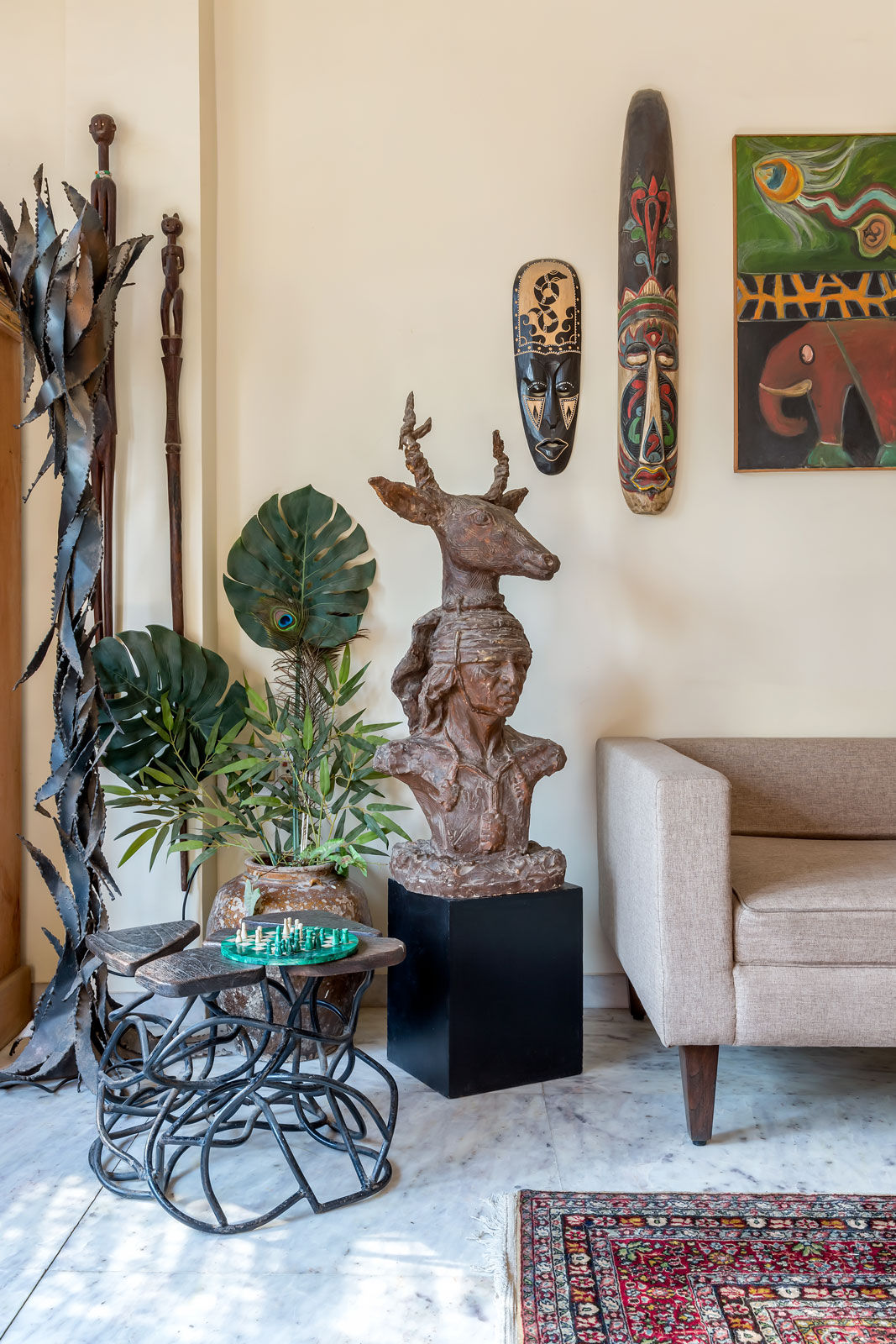 A Corner of the Living Room with an Assortment of Sculptures – Beautiful Homes