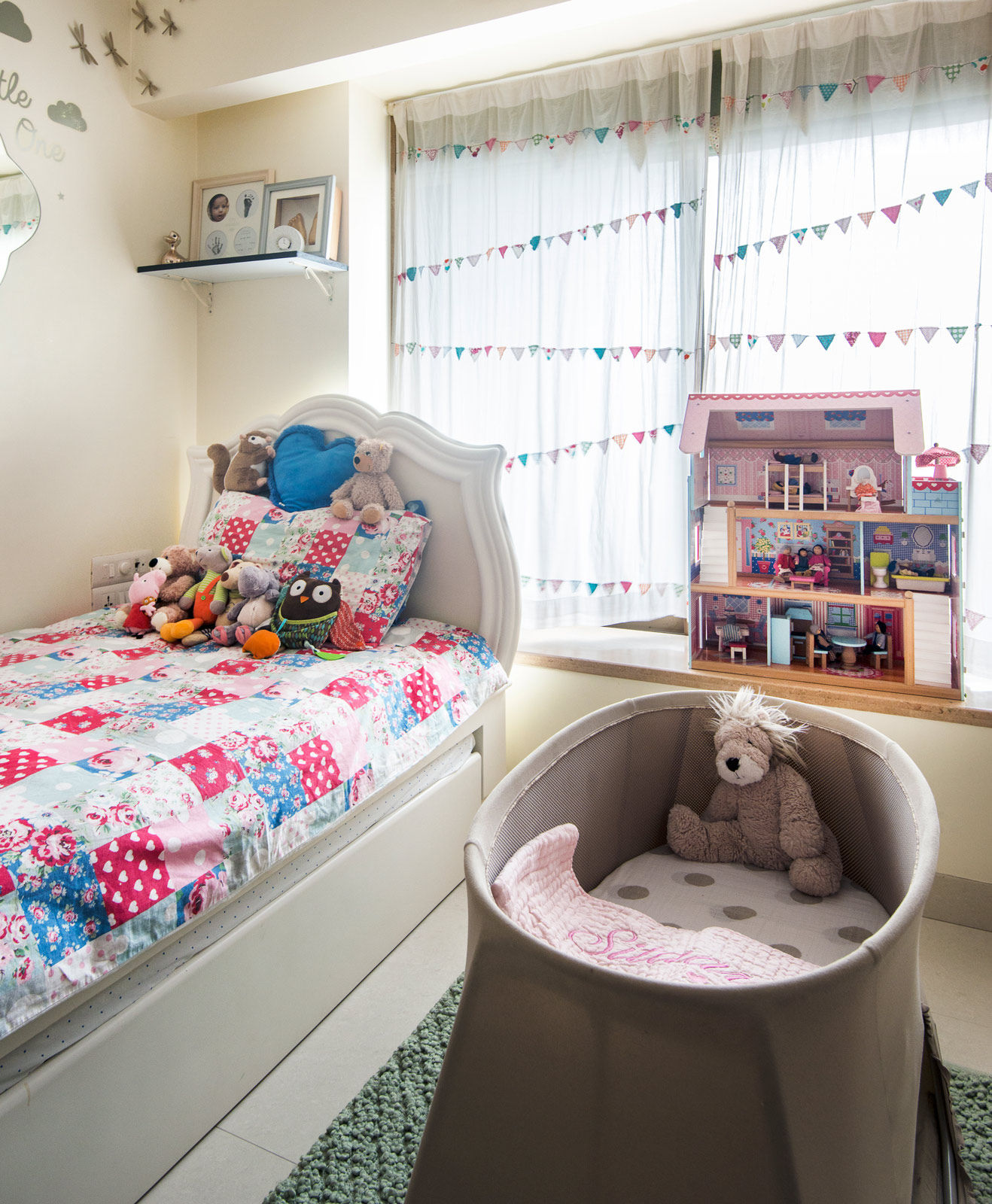The kids' room is also finished in white with upholstery and a doll house - Beautiful Homes