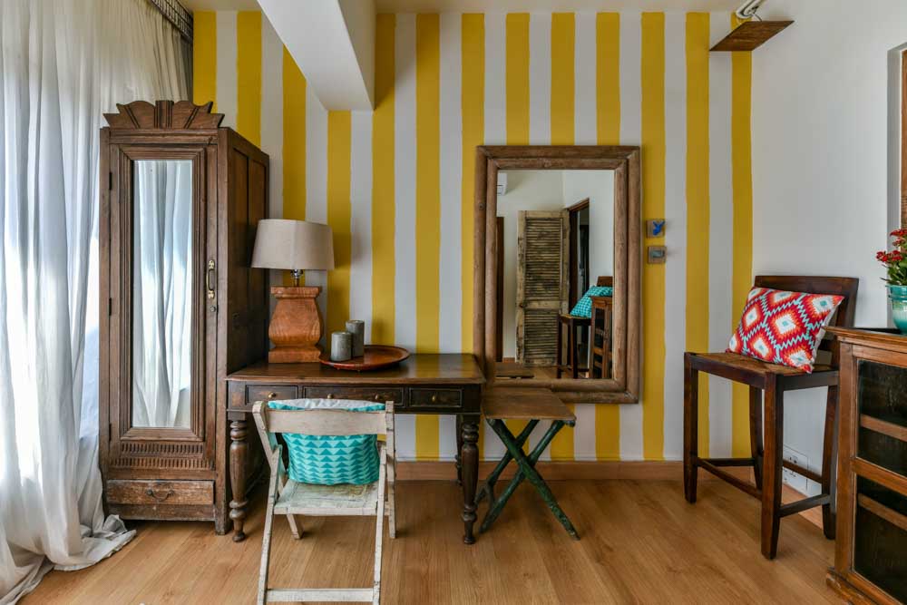 Study room has yellow hand painted wall & period furniture for home decor - Beautiful Homes