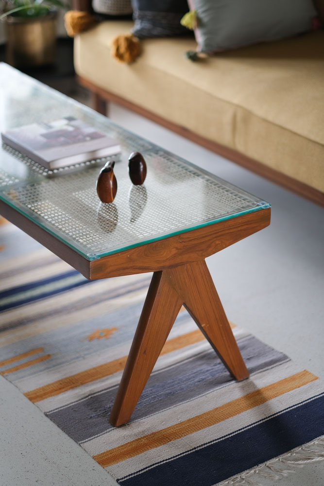 This bench-turned-coffee-table has a pair of penguins made in the Mysore inlay craft style - Beautiful Homes