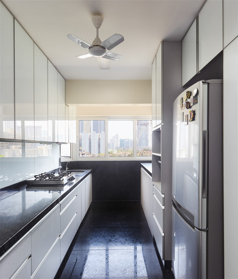 Pristine White Kitchen Interior Design With Black Countertop - Beautiful Homes