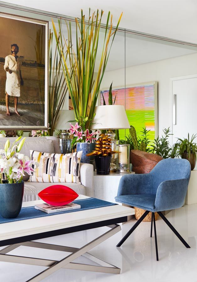 Living Room Design Ideas with Blue Chair & White Centre Table in a Mumbai Home - Beautiful Homes