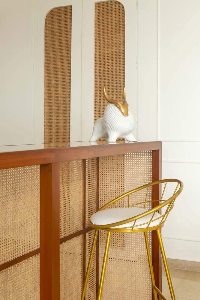 Rattan bar table created by the interior designers to make it visually appealing - Beautiful Homes