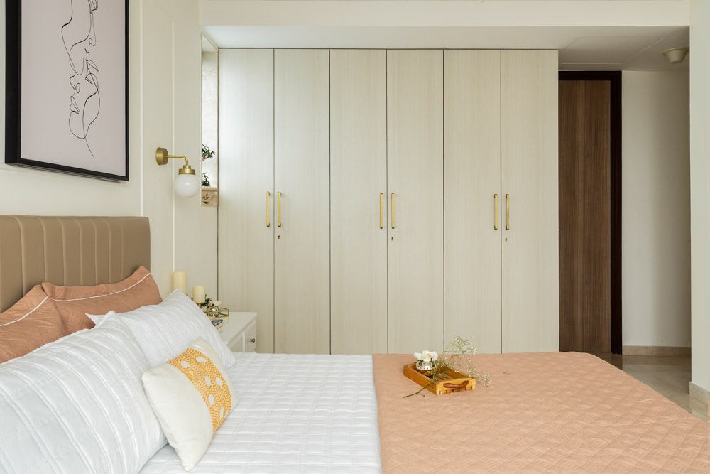Bedroom interior with a full-length wardrobe design - Beautiful Homes