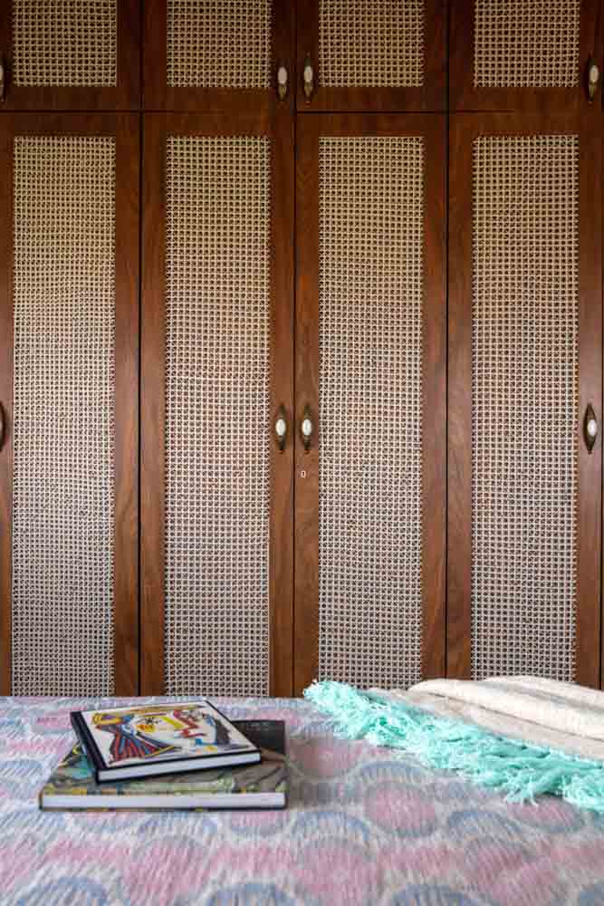 Cee Bee design studio created weaved rattan cupboard doors with vintage handles - Beautiful Homes