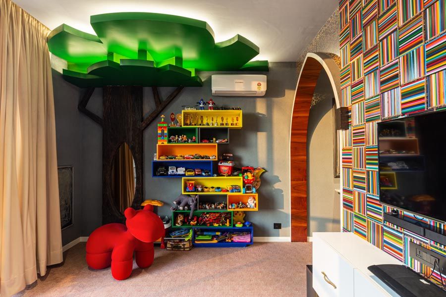 A kids room with a colourful shelf a full of toys - Beautiful Homes