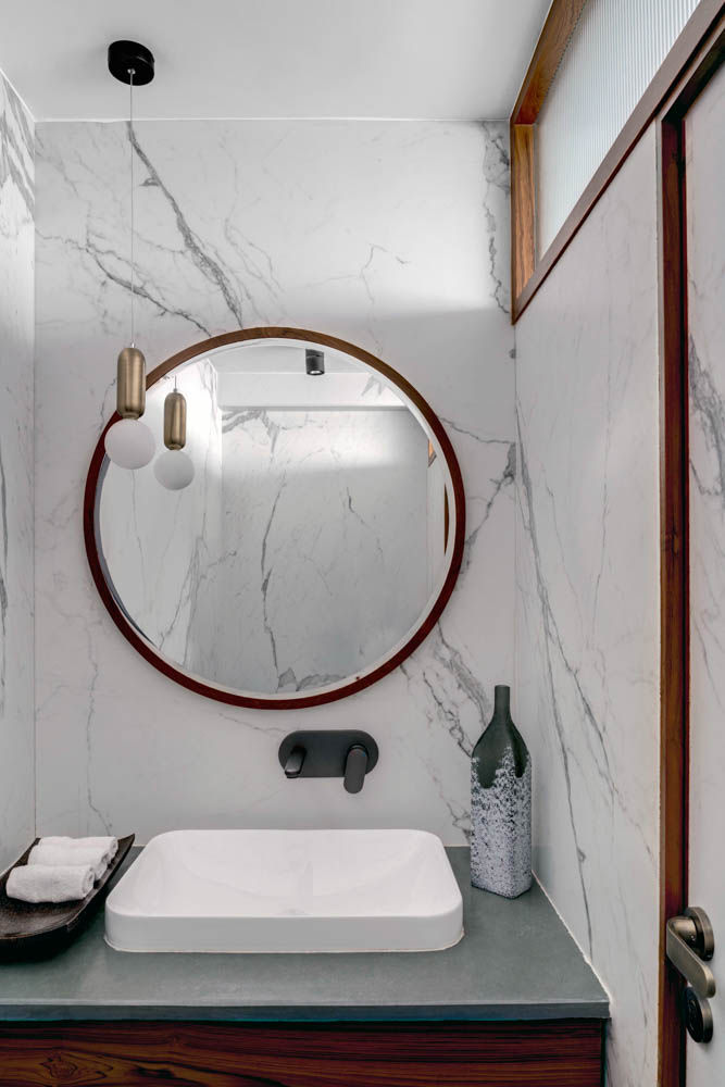 The bathroom interior design has a monochromatic colour palette - Beautiful Homes