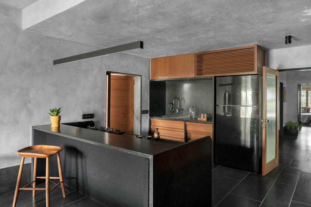 The kitchen design has minimalist interior design for a clutter free look - Beautiful Homes