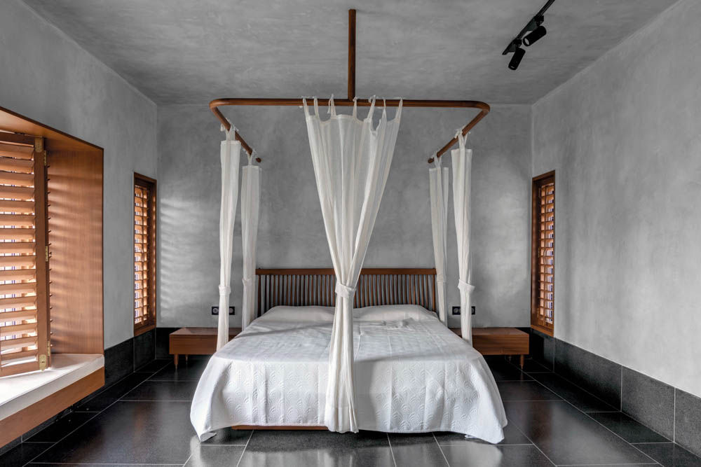 The master bedroom interiors has a four poster bed design - Beautiful Homes