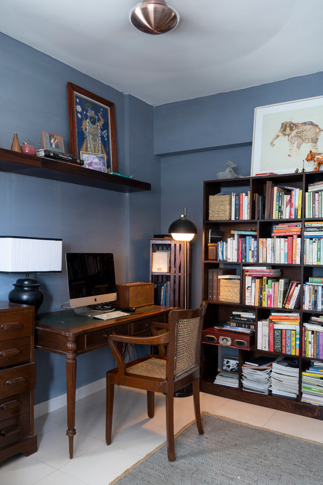 Anvitha's edit suite which also doubles up as library- study that has darker colour palette - Beautiful Homes