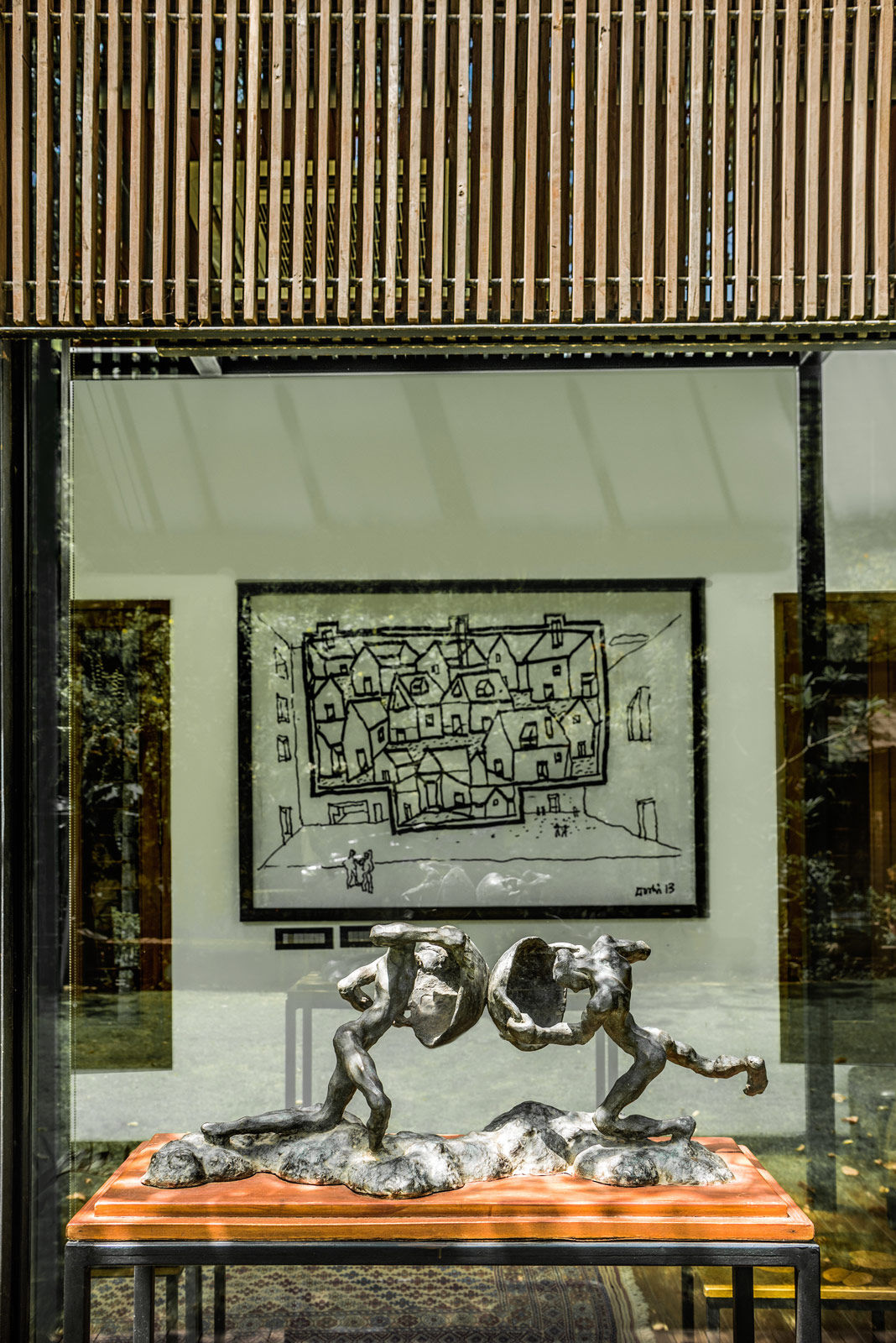 The artwork from the house is a mixed media on canvas by Balkrishna Doshi - Beautiful Homes